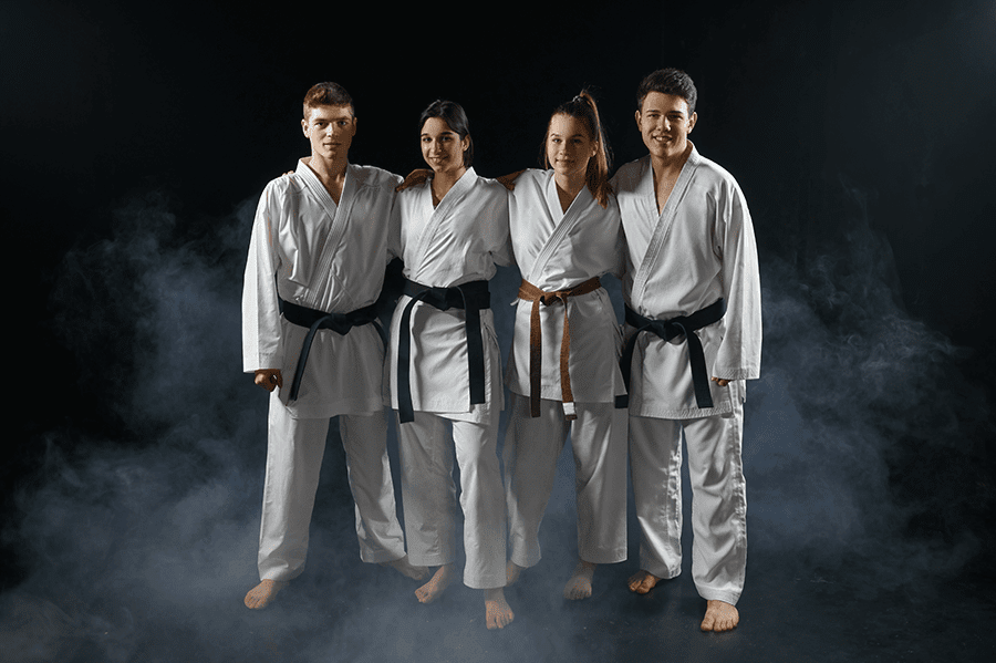 Four Karate Fighters White Kimono Poses Hug Group Training Karatekas Workout Martial Arts Fighting Competition 1, Guido&#039;s Martial Arts Academy
